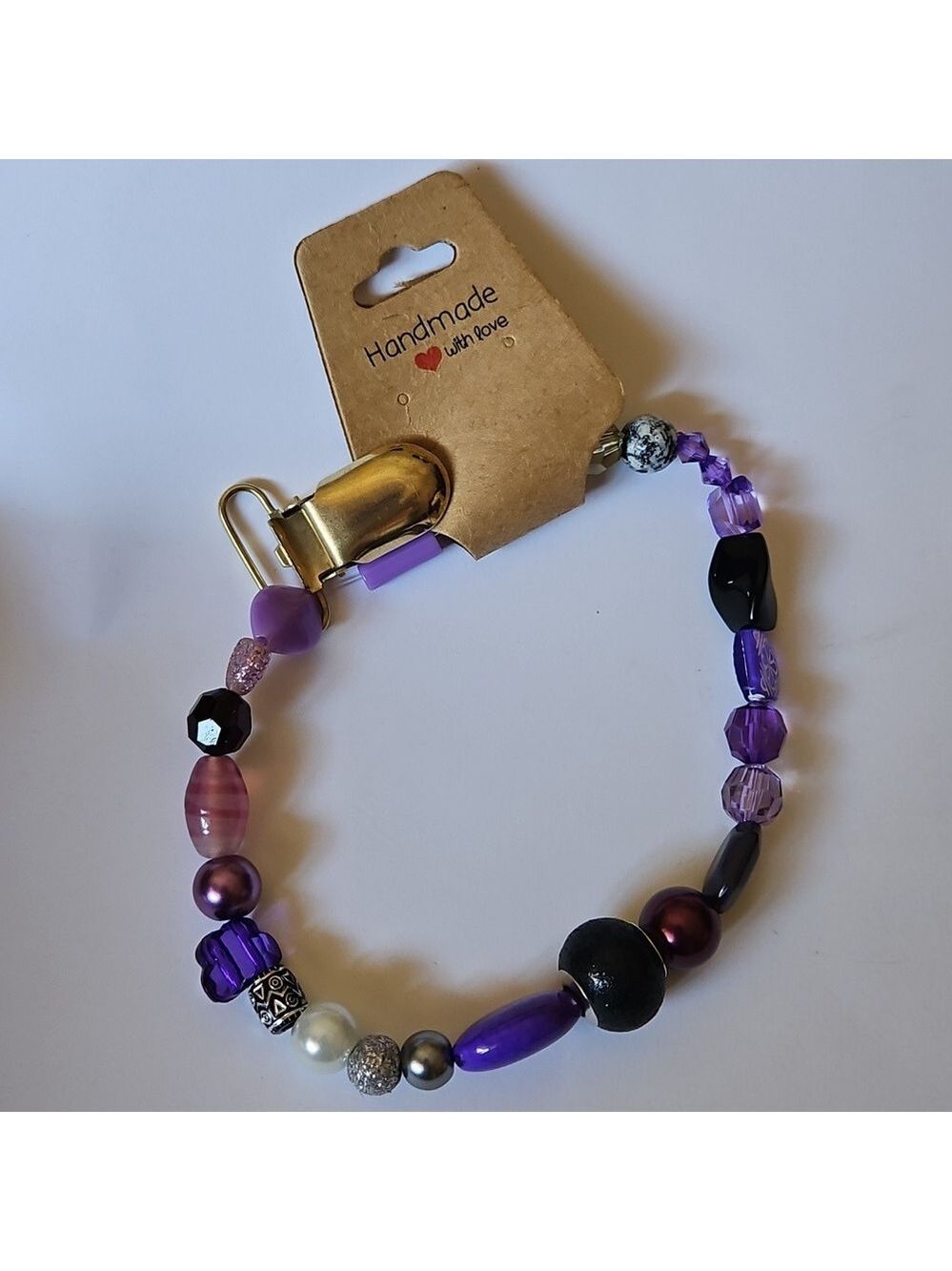 Handmade 5"stretch bracelet is a creative and colorful statement piece Purple